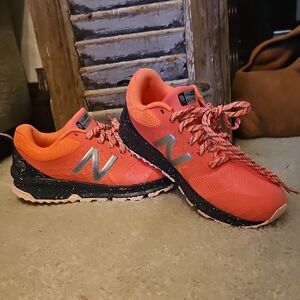 New Balance Orange and Black Sneakers